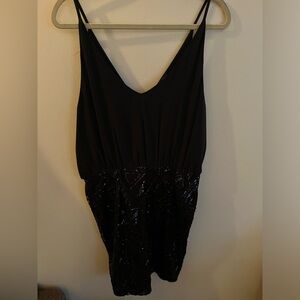 Sequined black mini dress with spaghetti straps